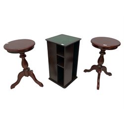 Pair of mahogany pedestal tables and a revolving CD rack