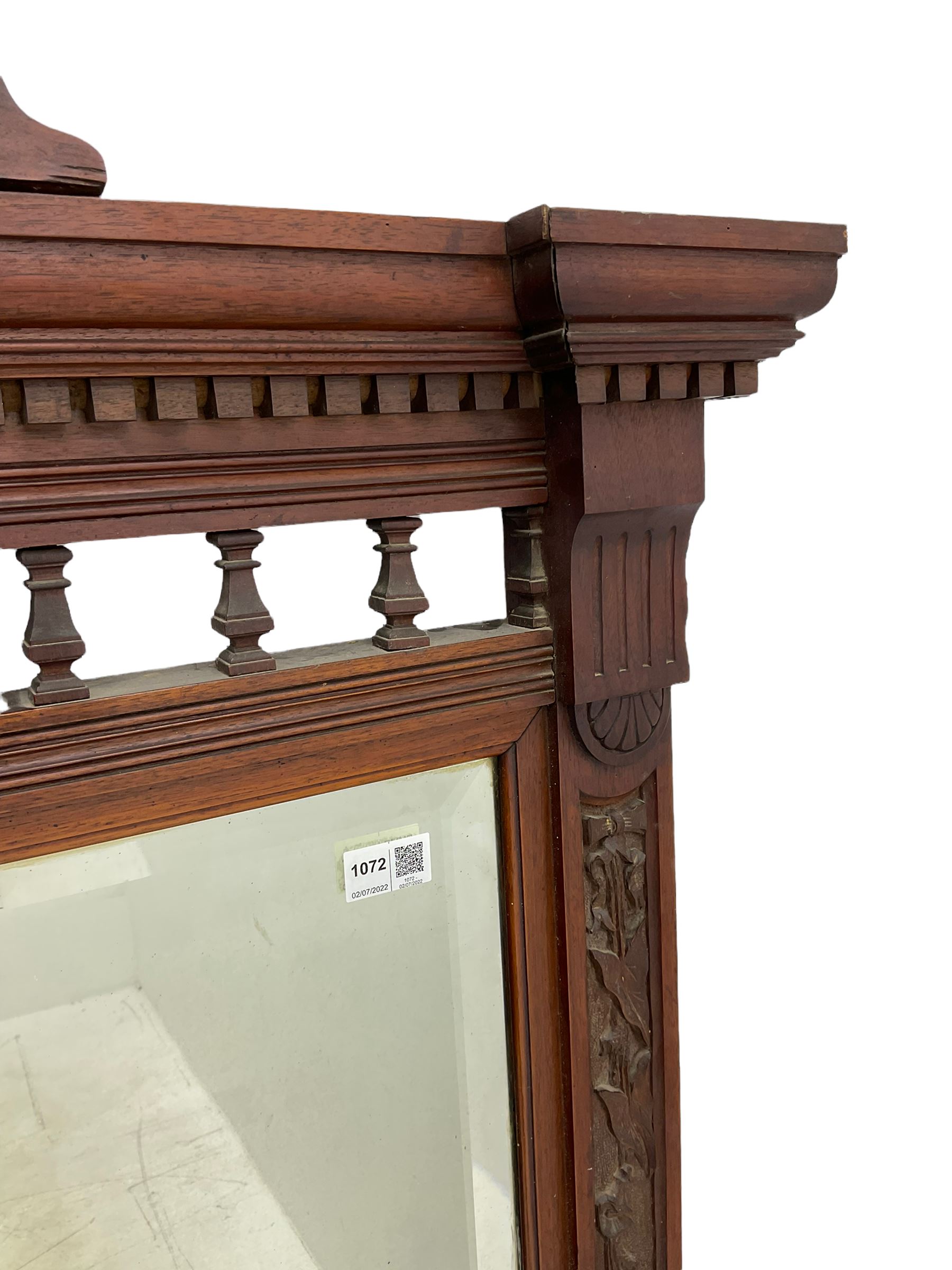 Edwardian walnut over-mantle mirror, bevelled plate