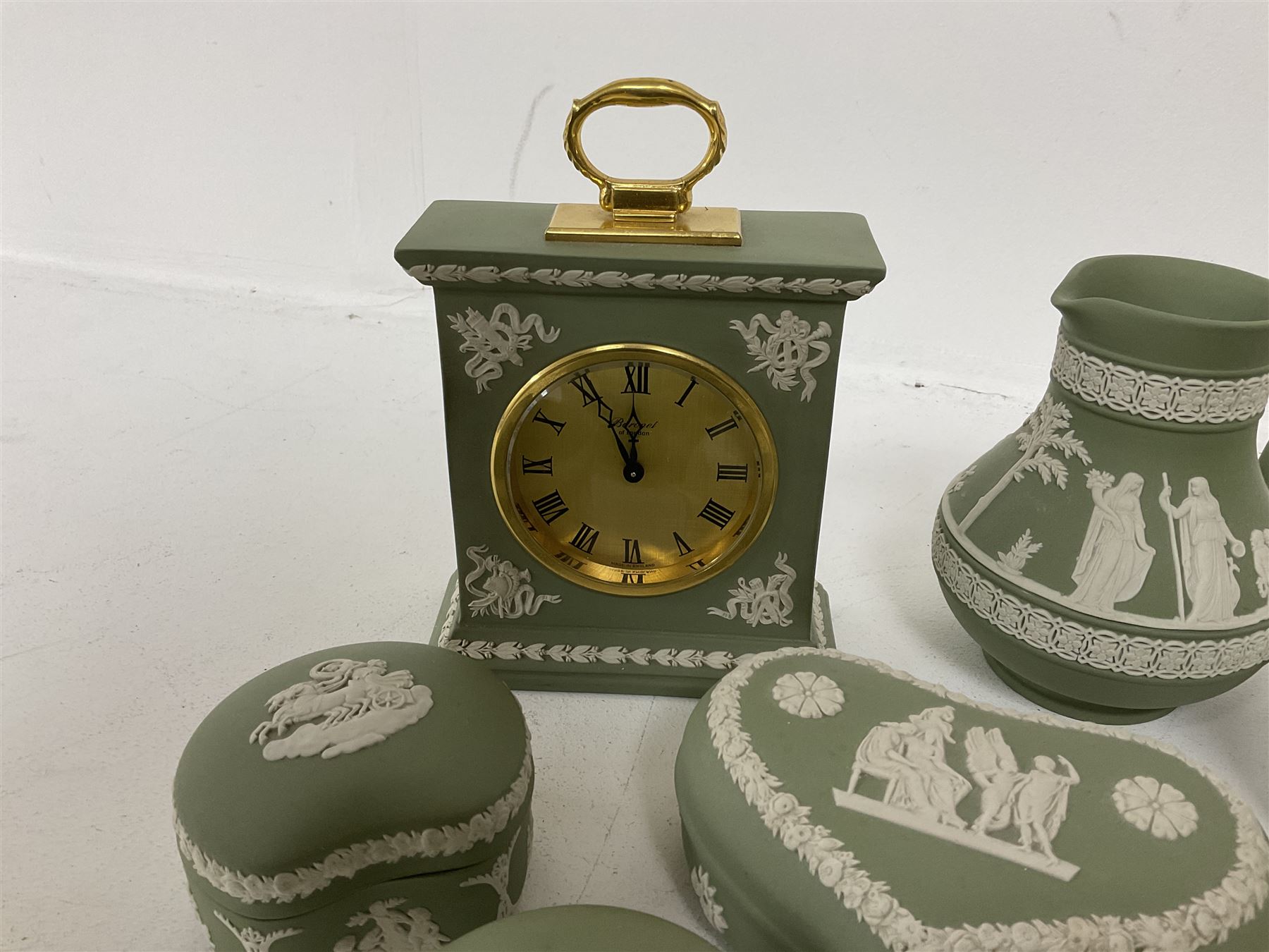 Group of Wedgwood sage green Jasperware, to include jug, vases, lidded boxes, dishes etc
