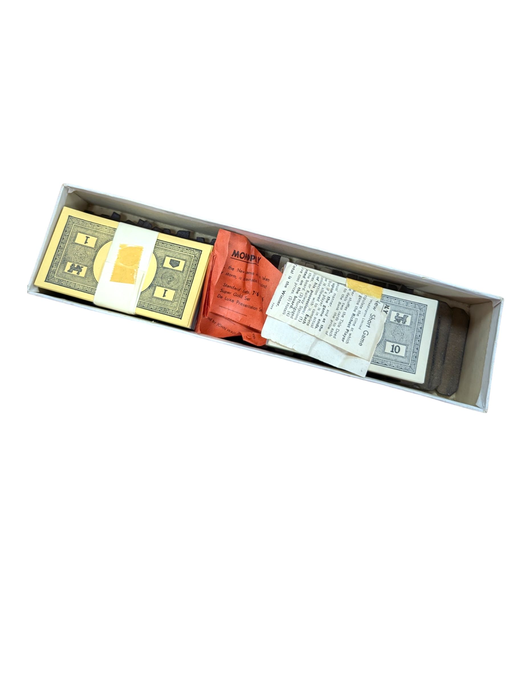 Vintage Monopoly, including boxed Swedish version and boxed note holders