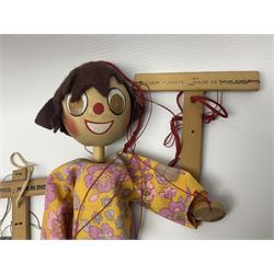 Pelham Puppet - three puppets comprising a painted wooden duck with felt mouth and wings with metal joints H12cm, in original box and instructions; and two further examples Type A cat with a hollow body H12cm, and a boy H23cm (3) 