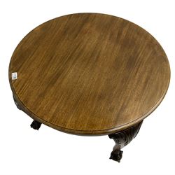 Victorian design mahogany circular coffee table, raised on cabriole supports decorated with acanthus leaf moulding, terminating in ball and claw feet