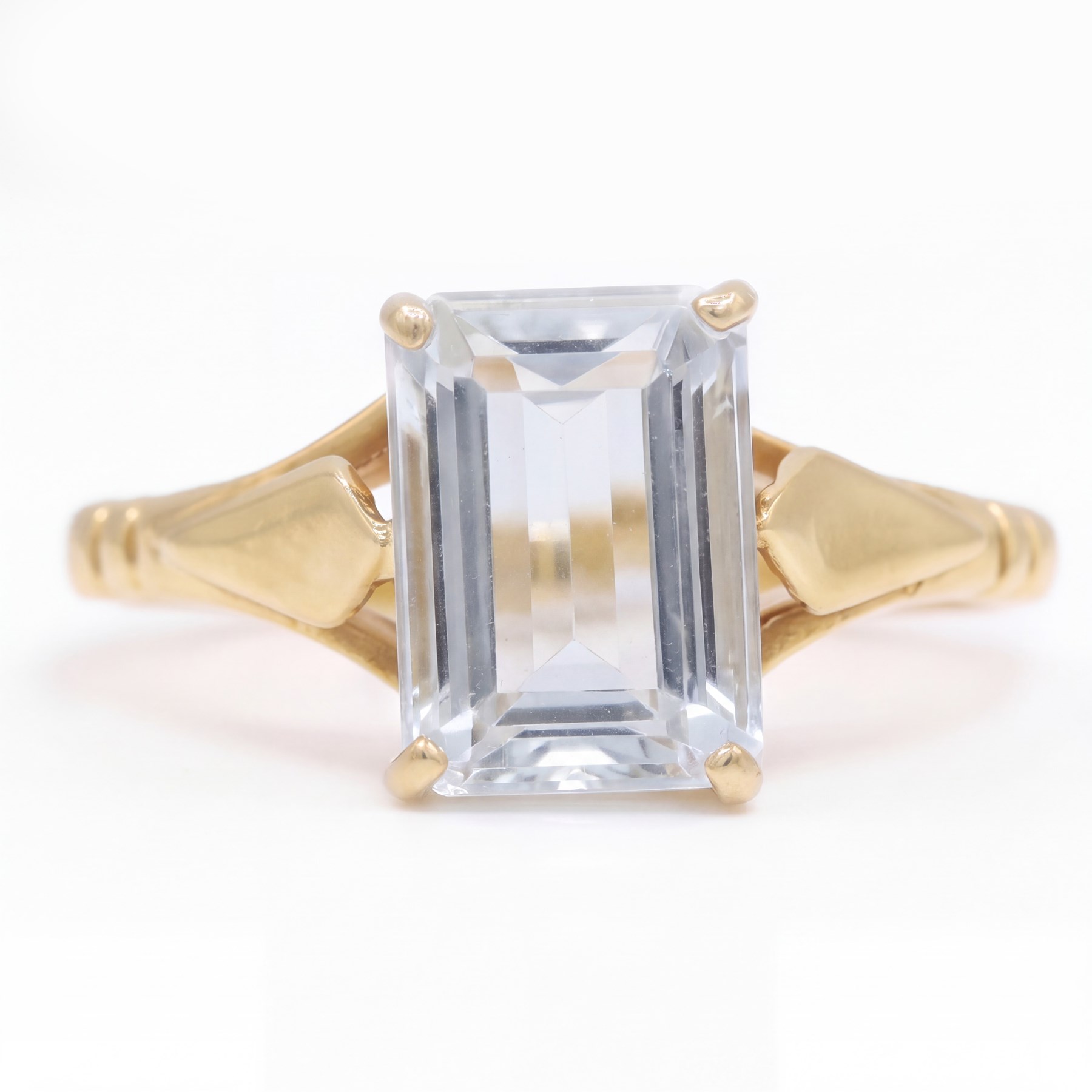 Early - mid 20th century gold aquamarine ring, four claw set with a single emerald cut aquamarine of approx 1.40 carat, stamped 18ct