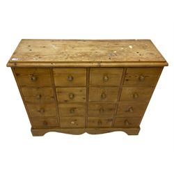 Reclaimed pine chest, fitted with sixteen drawers