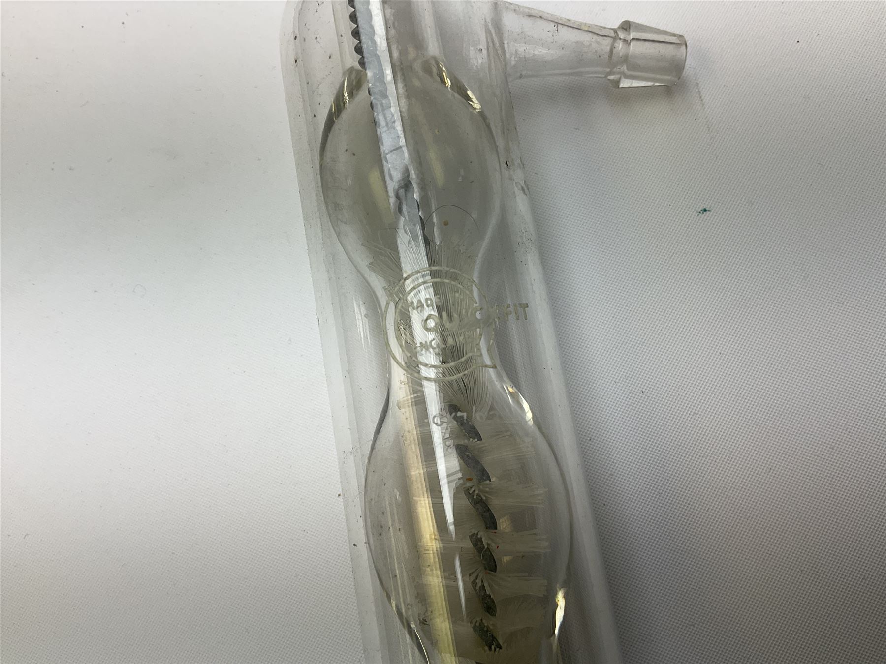 Quantity of laboratory and physics glassware including 'Guinea and Feather' equipment; boxed Latent Heat apparatus; Maltese Cross tube; atmospheric air pressure indicator flask; electroscope discharge tubes etc