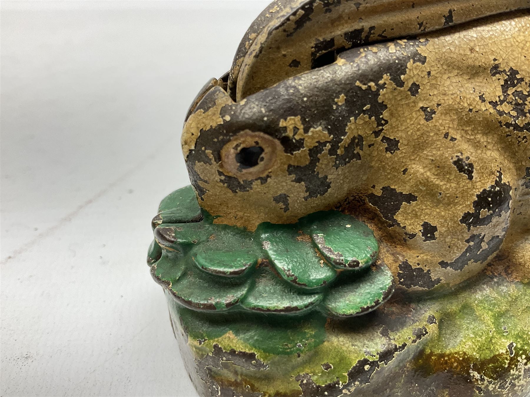 Two early 20th century cast-iron mechanical money banks - 'Rabbit on Cabbage' by Kilgore Manufacturing Company c1921 L11cm; and 'Elephant Swings Trunk' by A C Williams & Co patented 27th June 1905 L12.5cm (2)