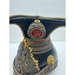 16th Queens Lancers Officers Lance Cap, black leather body with gilt braid lace and gilt wire braiding to the peak, officers silver gilt helmet plate to the front, the black cloth mortar board top with thick bullion wire, the bullion socket holder with embroidered GR cipher to the centre, lion head side bosses with velvet backed linked chinstrap, interior with leather sweatband and cloth lining, marked Carter & Co Pall Mall, the helmet is housed in japanned storage tin with brass plaque engraved “Lieu H L Evans, 16th Lancers'