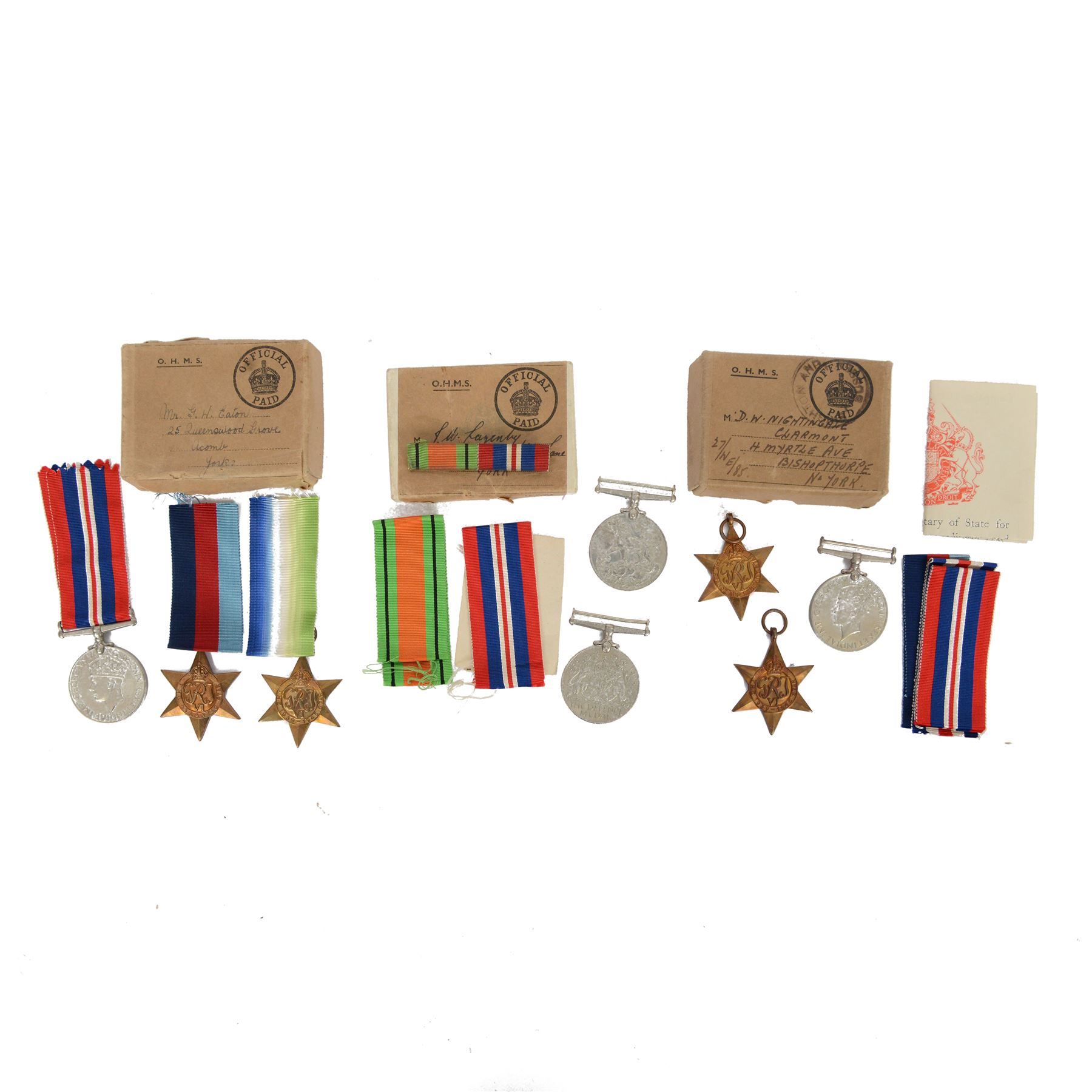 Three sets of WWII medals, comprising trio 1939-45 Star, French and German Star and War medal, awarded to D W Nightingale, trio, 1939-45 Star, Atlantic Star and War medal, awarded to GH Eaton and pair defence and war medal awarded to S Lagenly, all awarded to soldiers from the York area   