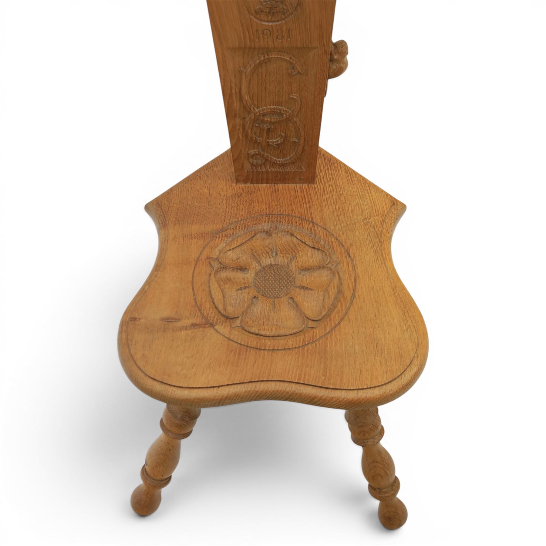 Beaverman - Oak hall chair with commemorative carved back panel  dated '29th July, 1981' for Prince Charles and Princess Diana royal wedding, with carved Yorkshire rose and the Prince of Wales feathers, on turned supports, with carved beaver signature, by Colin Almack of Sutton near Thirsk