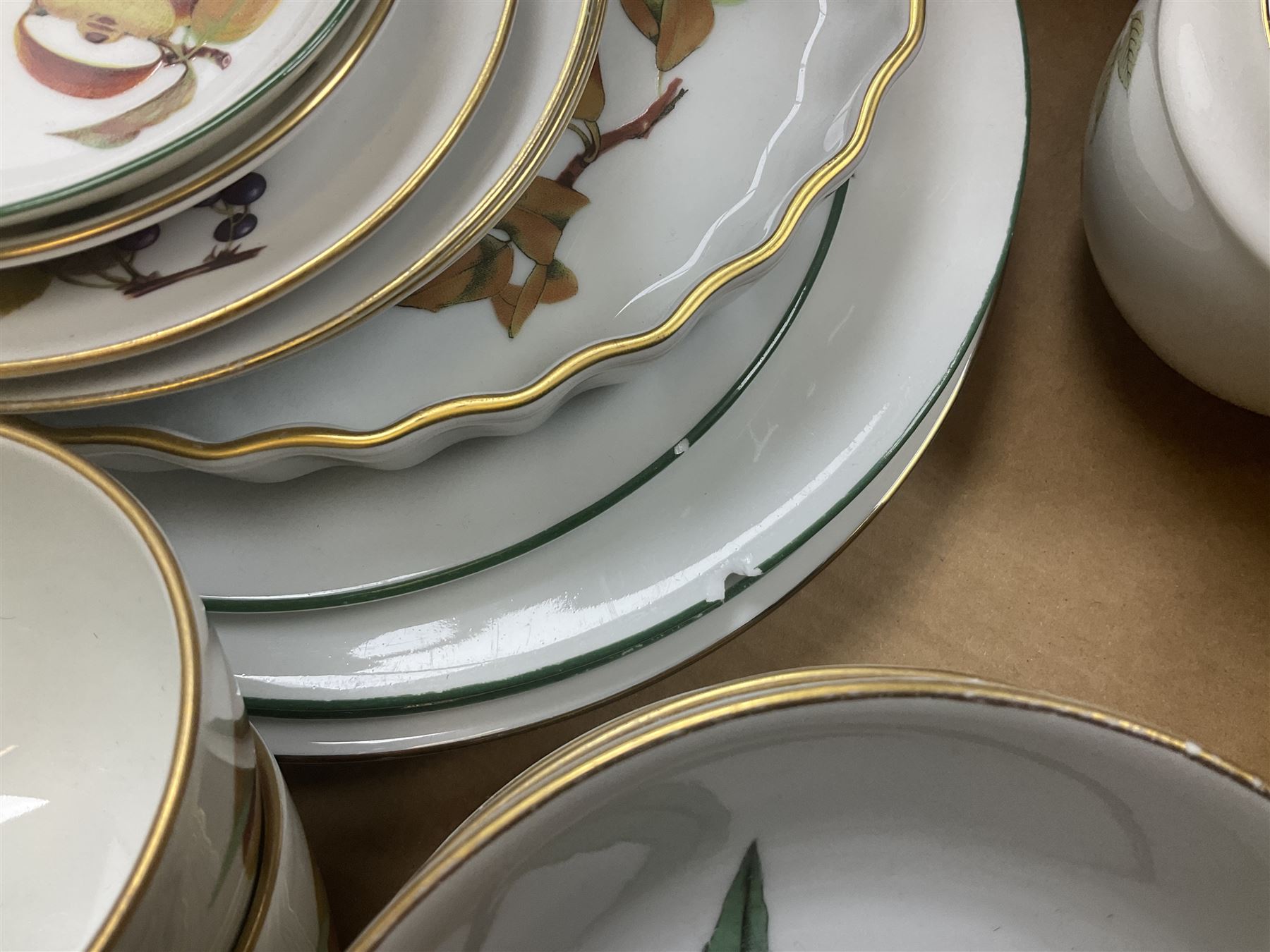 Royal Worcester Evesham and Evesham Vale tea and dinner wares, to include, three large covered tureens, coffee pot, eight tea cups and saucers, milk jug, two covered sucriers, boxed serving spoons etc, approx .130