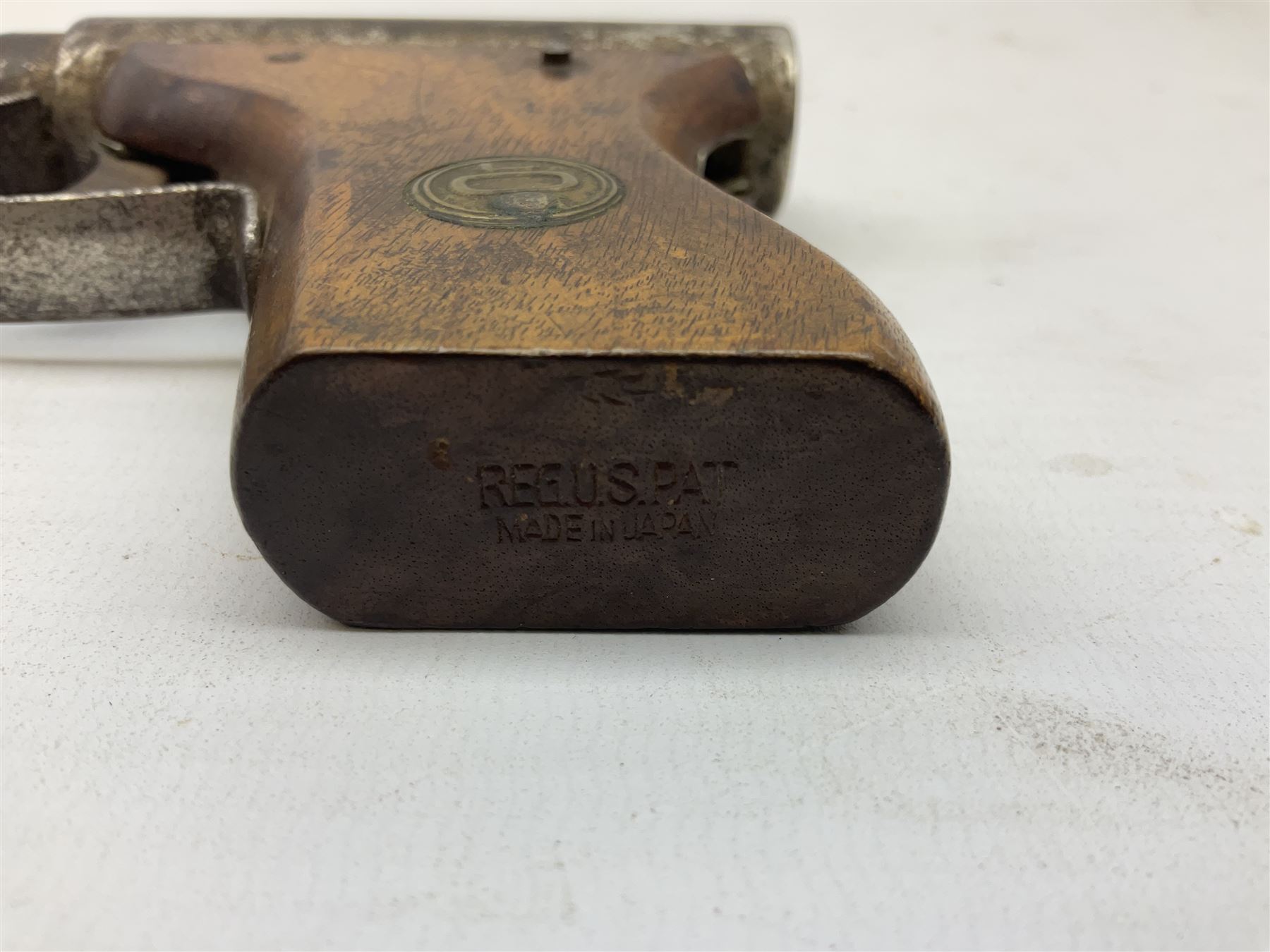 GAT .177 plunge action air pistol the butt impressed 'Reg.Us.Pat. Made in Japan' L22cm