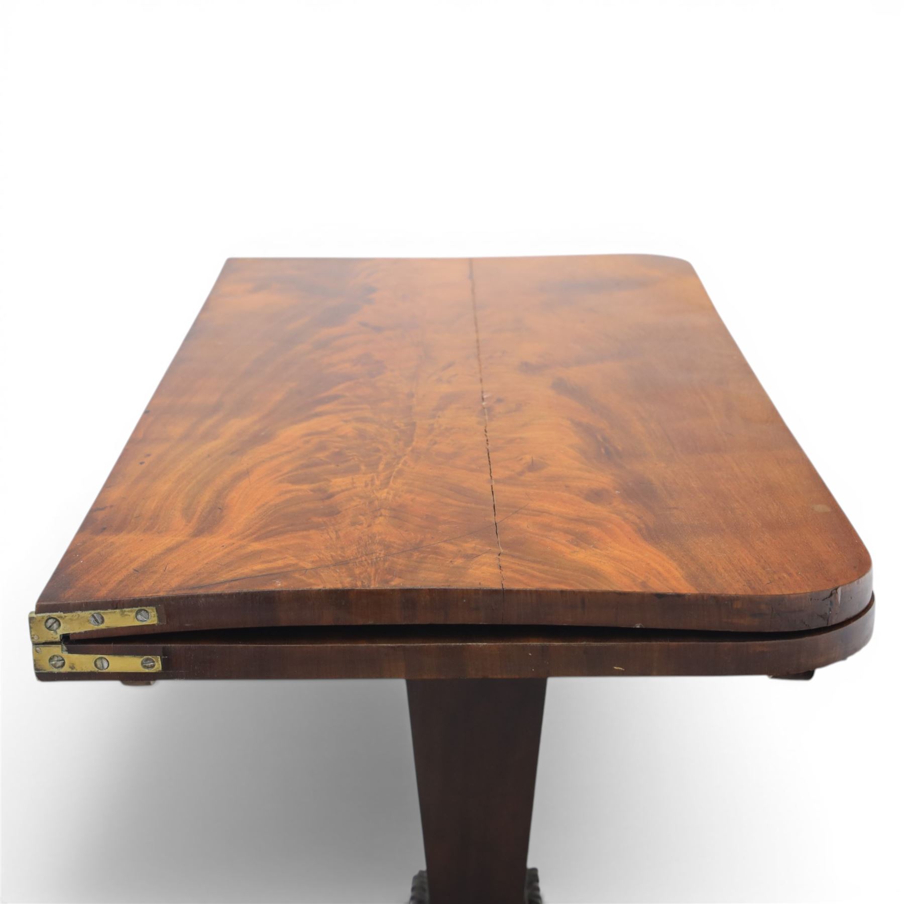 Victorian figured mahogany side table, fold-over swivel extending top, tapering square column above quatrefoil base