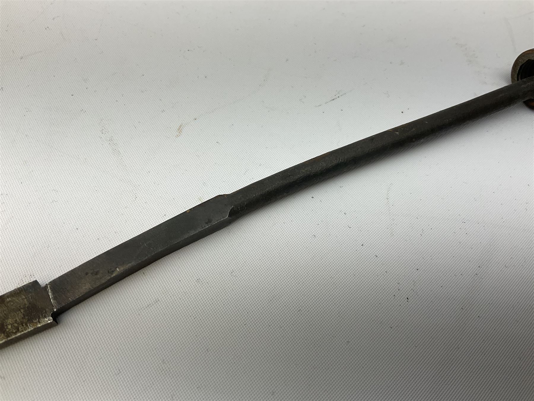 Patinated 'bronze' fantasy dagger, the 26cm blade, hilt and scabbard cast with dragons L50cm overall; hand forged iron spearhead L29.5cm; and a stiletto blade (3)