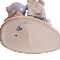 Three Lladro figures, comprising The Professor 5208, Artistic Endeavour 5234 and Reading 5000