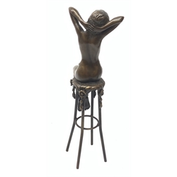After D H Chiparus, an Art Deco style bronze modelled as a nude female figure seated upon a chair, H28cm. 