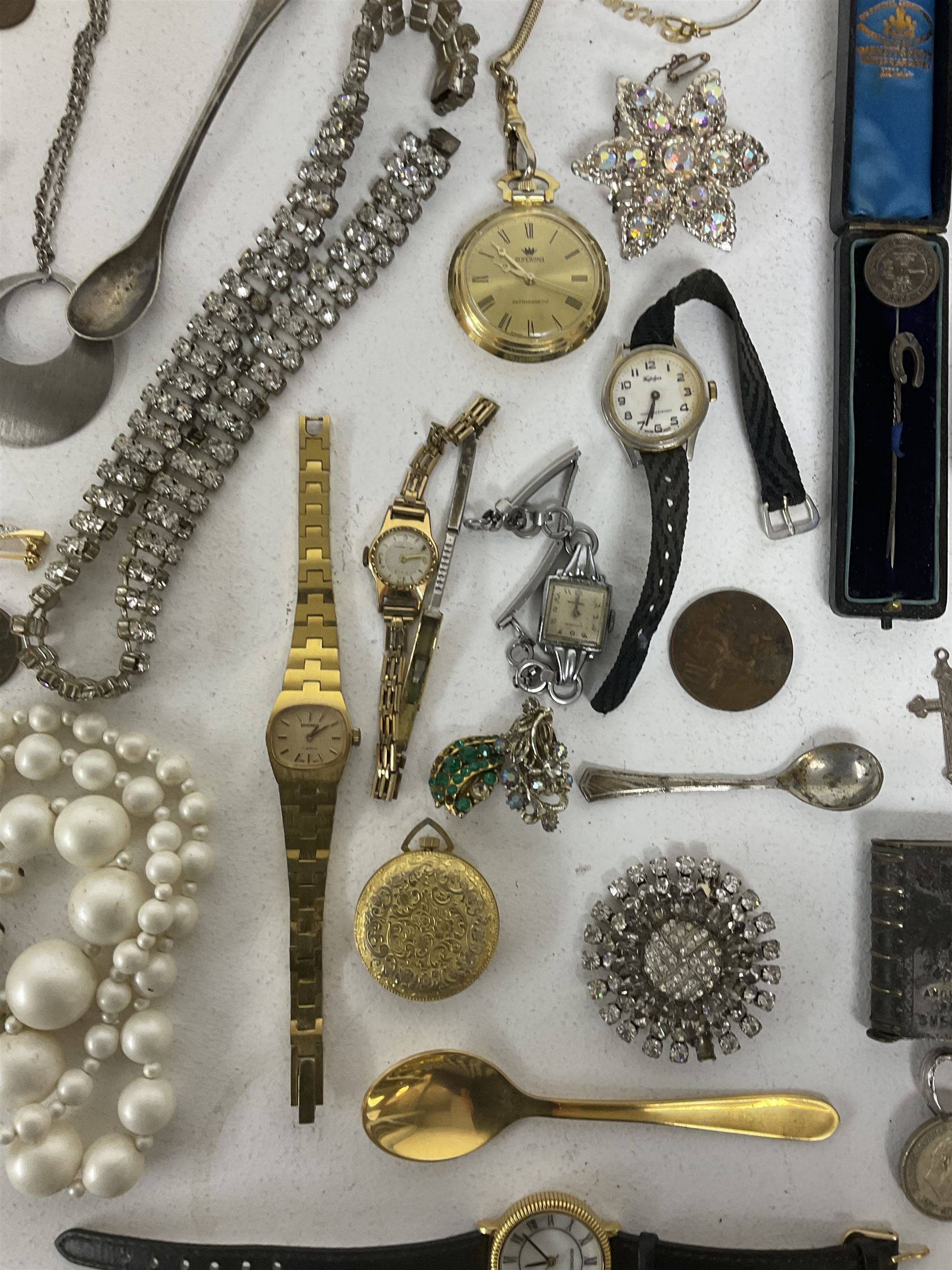 Silver horseshoe stick pin, silver cross pendant, silver-gilt Pobjoy Mint Earl Mountbatten of Burma commemorative medal, a collection of costume jewellery including brooches, necklaces and wristwatches and three base metal vesta cases 