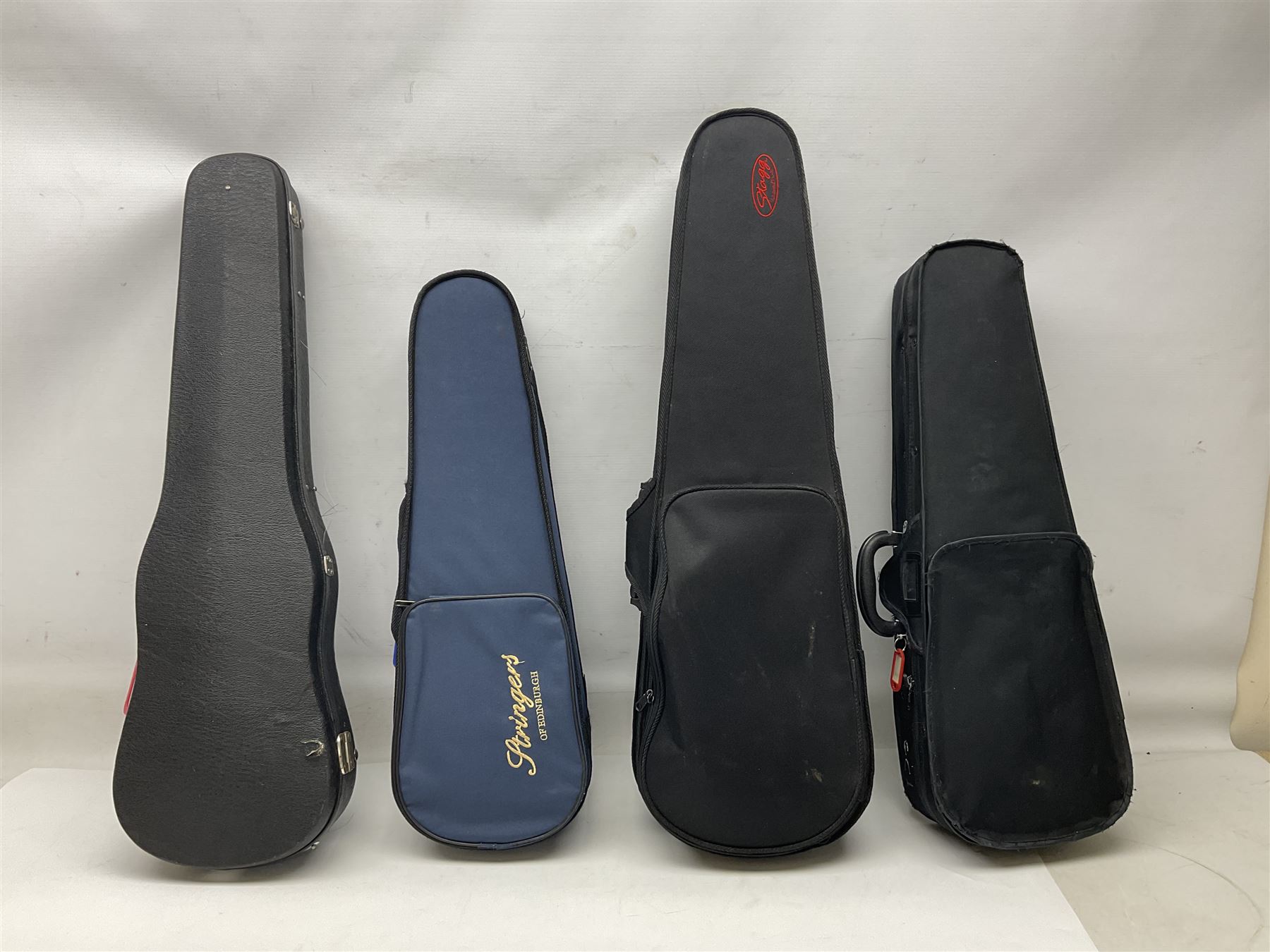 Four student violins - two Chinese three-quarter size with 33.5cm and 34cm two-piece backs; Stringers of Edinburgh quarter size with 28cm two-piece back; and Stentor quarter size with 28cm two-piece back; each in carrying case (4)
