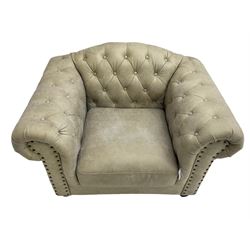 Chesterfield style club armchair, upholstered and buttoned in champagne fabric with stud work
