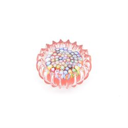 Two Peter Dougall glass paperweights, one of domed form, internally decorated with a  multicoloured millefiori canes, the other with fluted edge the with millefiori canes on a red ground, together with Whitfriars paperweight, all signed    