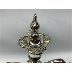 19th Century silver plated three light candelabra of foliate design by Hawksworth, Eyre & Co Ltd, with loaded stem and quatrefoil stepped base with shell decoration at the corners, with flambé snuffer, H52cm