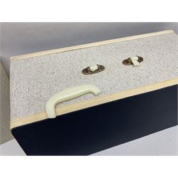 Seamstress sewing machine in case, together with a Singer sewing book