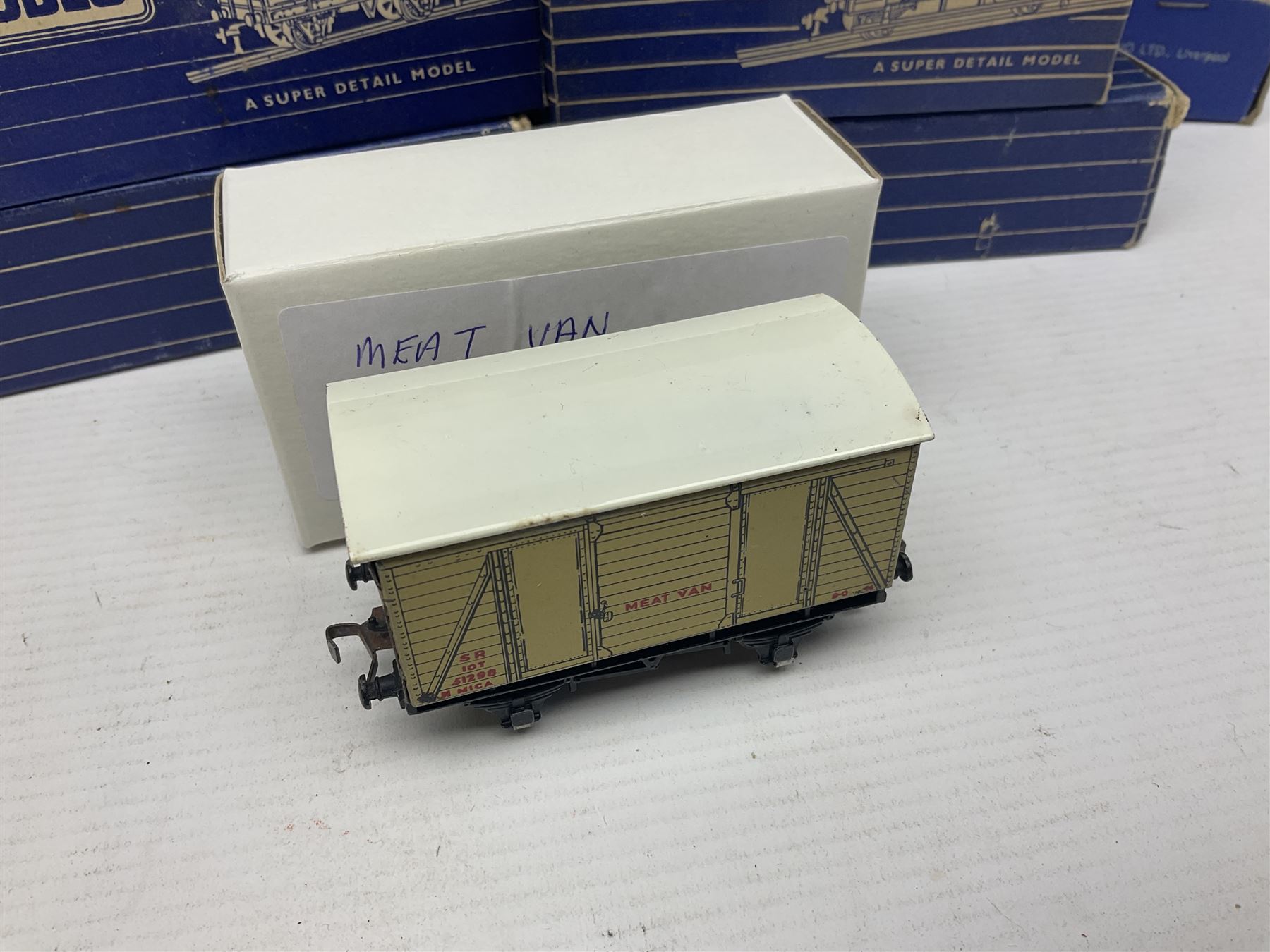 Hornby Dublo - nineteen goods wagons comprising 32040 Goods Van D1 (SR) in LMS stickered box, DR375 Goods Van D1 (GW), D303 Open Goods Wagon D1 (GW), 32044, 32076, 32052, 32021, 32074, 32056, 32065, DR379, 32070, 32020, DR373, two x 32075, High Sided Wagon D2 (LMS) in NE stickered box; all boxed; Tank Wagon D1 (Esso) and DR380 Meat Van D1; both in later unassociated boxes (19)