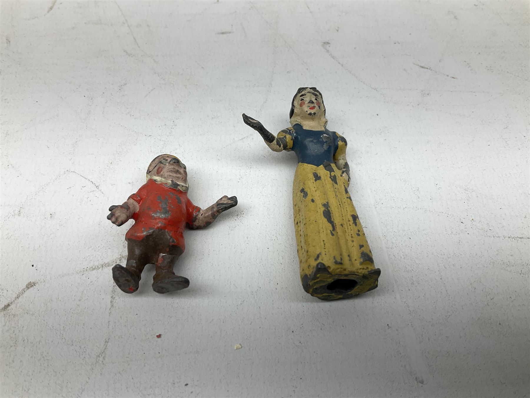 Collection of twenty-two Britains Cadbury's Cococubs play worn lead painted figures to include Mr Pie Porker, Mrs Pie Porker, Tiny Tusks, Captain Kangaroo, Granny Owl and others, Britains Snow White and Doc lead figures and other painted lead figures (30)