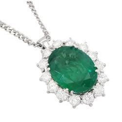 18ct white gold oval cut emerald and round brilliant cut diamond, cluster pendant necklace, hallmarked, emerald approx 4.00 carat