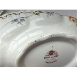 Royal Albert Old Country Roses pattern tea set, comprising teapot, coffee pot, six teacups and six saucers, five side plates, further teacup with joined saucer and side plate, open sucrier, milk jug, cake plate, and preserve pot and cover, together with Royal Albert Jubilee Rose pattern sauce boat and stand, and Royal Albert Lavender Rose pattern cake stand. 