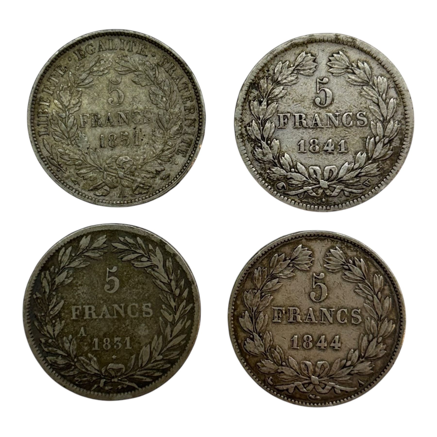Four French silver five franc coins, dated 1831 A, 1841 W, 1844 A and 1851 A 