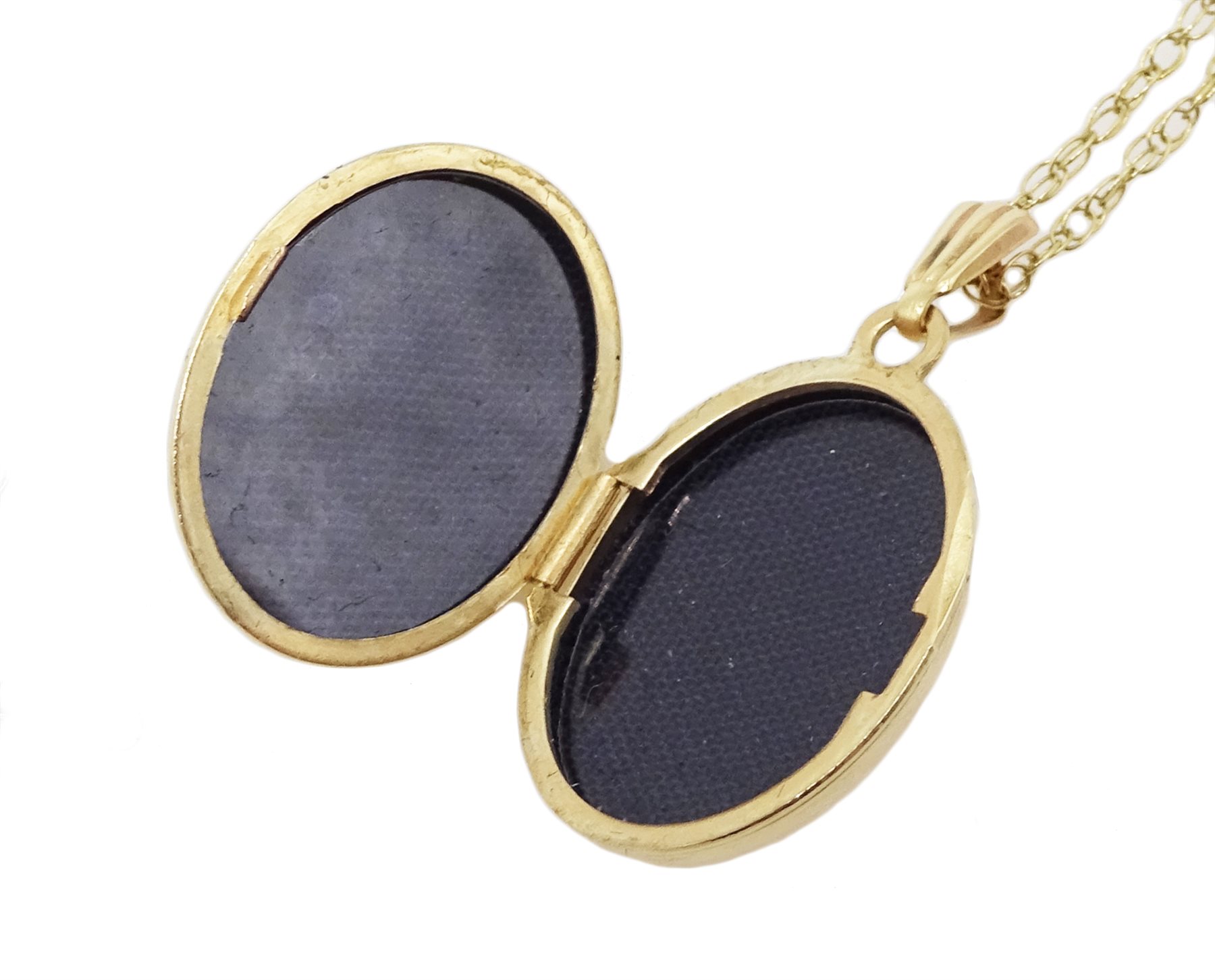 Gold stone set rag doll pendant necklace and gold garnet locket pendant necklace, all 9ct hallmarked or stamped