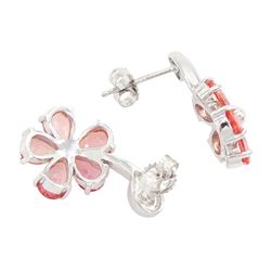 Pair of 18ct white gold padparadscha sapphire flower head stud earrings, each stem suspending a pendant flower head, set with five pear cut sapphires, Birmingham 2006, total sapphire weight approx 3.95 carat