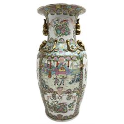 20th century Chinese Canton floor vase, of baluster form painted to each side with panels containing officials and attendants, with foliate borders of peony, fruiting peach sprays and exotic birds, H93cm 