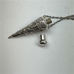 Victorian and later silver chatelaine, the shaped and foliate pierced clasp with embossed oval panel of a courting couple, hallmarked Levi & Salaman, Birmingham 1899, supporting six accessories on five chains: a circular mirror embossed with putti, hallmarked Henry Matthews, Birmingham 1911, pencil holder engraved with foliate scrolls, hallmarked Francis Webb, Birmingham 1914, conical scent bottle decorated with bamboo, (unmarked but testing as silver), aide memoire embossed with putti, hallmarked Samuel M Levi, Birmingham 1911, tape measure of compressed spherical form, hallmarked Henry Matthews, Birmingham 1899, and a purse with embossed putti, hallmarked Birmingham 1909, makers mark worn and indistinct, at longest point L31cm

