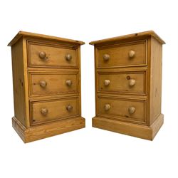 Pair of solid pine bedside chests, fitted with three drawers with moulded reeded facias, on plinth bases