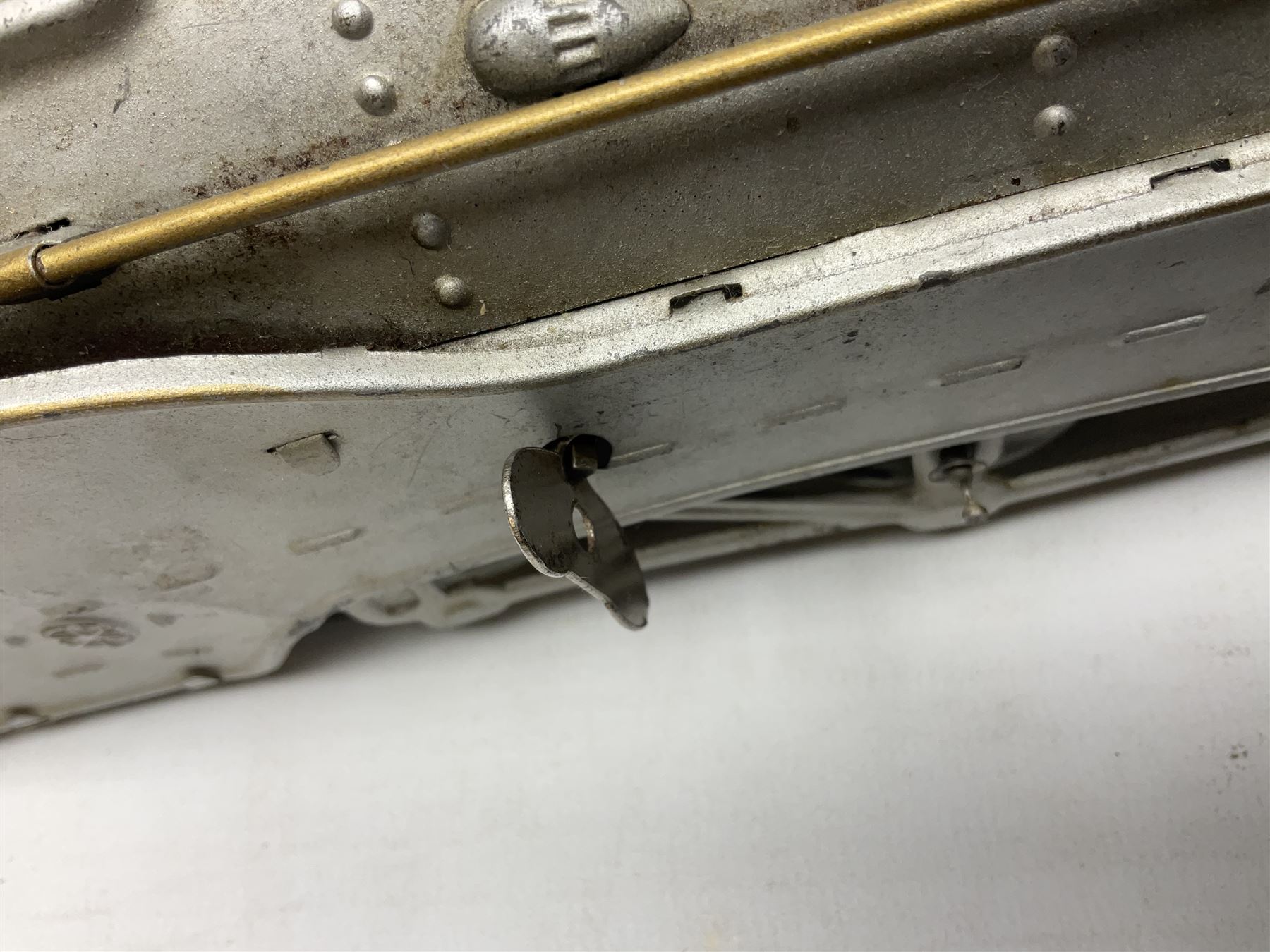 Schylling Collector Series clockwork tin-plate Sir Ian's Bluebird Land Speed Record Car with key and paperwork No.006080; boxed; and clockwork silvered tin-plate model of an 0-6-0 locomotive; unboxed (2)