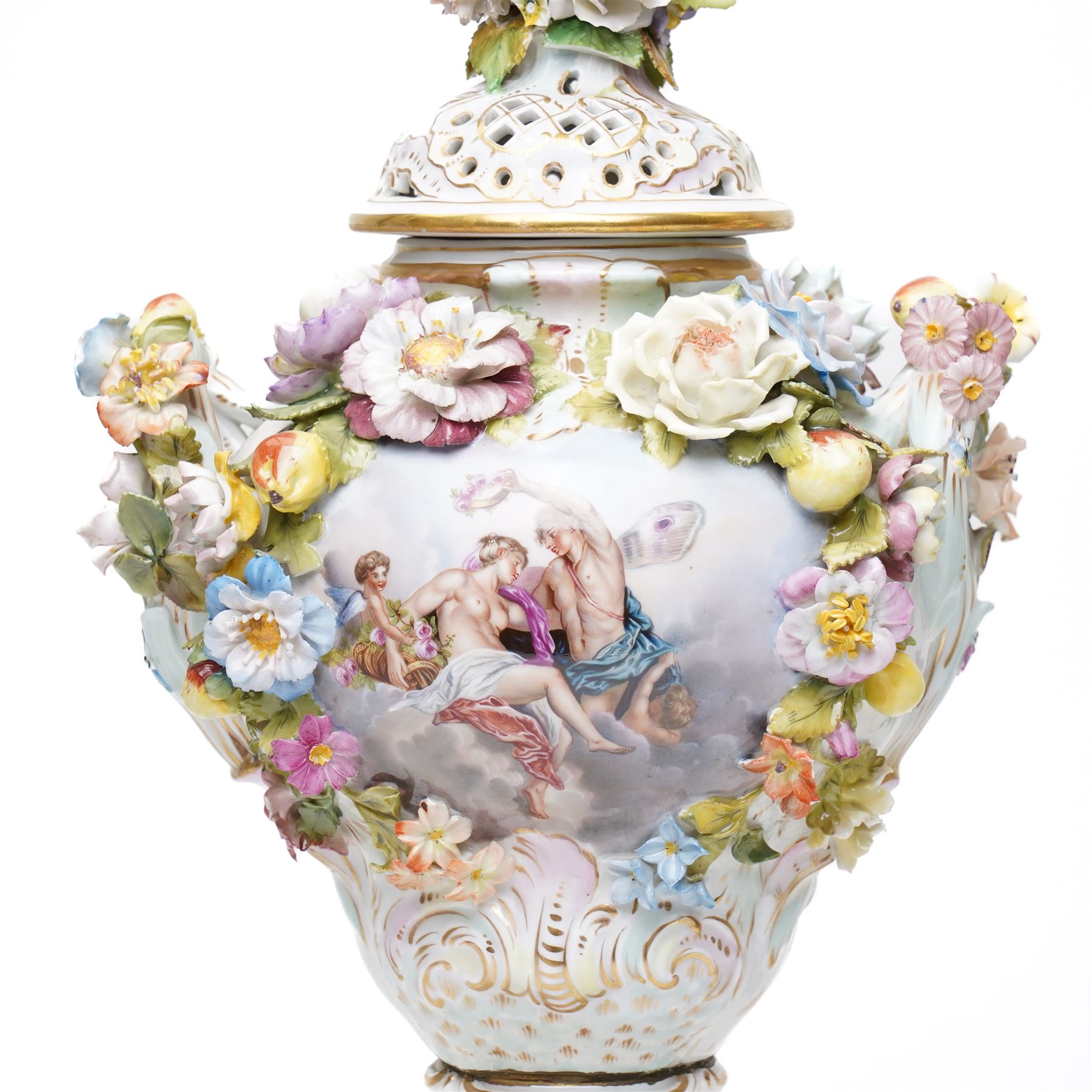 Pair of 19th century Potschappel porcelain two handled vases with covers and stands, painted with scenes of classical figures including Dionysus and Ariadne and with profusely applied flower heads on a scrolling field with gilt highlights H49cm (2)