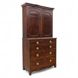 George III mahogany linen press, moulded cornice above a pair of panelled doors with gadro...