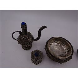 Group of Indian silver, to include two miniature Kendiya pots, with wire work decoration, one with cover set with carnelian, the other with lapis lazuli, a similar hexagonal pill box, the cover set with lapis lazuli and an open silver salt, with embossed Goddess decoration, upon three elephant feet, all unmarked but tests silver 