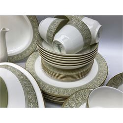 Royal Doulton Sonnet pattern part tea and dinner service, including  twelve dinner plates, twelve bowls, twelve side dishes, two covered tureens, one meat platter, coffee pot, twelve coffee cans and saucers etc (approx 90)