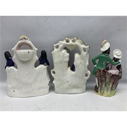 Collection of 19th century and later Staffordshire figures, to include a pair of Red Riding hood spill vases, Fortune Teller, man picking grapes, etc  