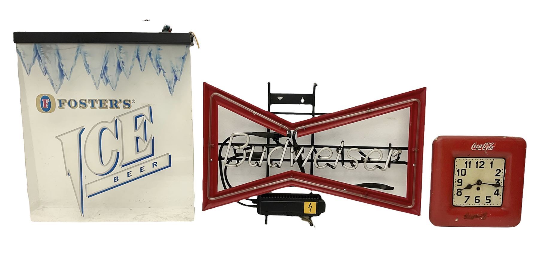 Electric neon Budweiser advertising sign, together with a Foster's example etc