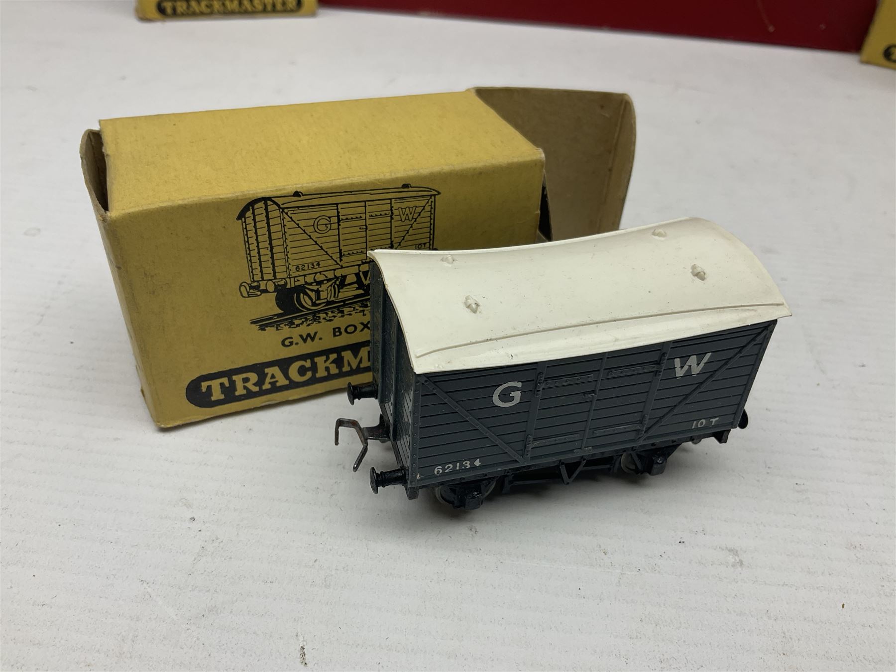 Hornby Dublo - 4620 Breakdown Crane No.133 in red with Match Trucks; boxed; another unboxed 4620 Breakdown Crane No.144 in black 'Cowans Sheldon' with Match Trucks; and nine Trackmaster goods wagons comprising three GW Open Wagons, two GW box vans, three NE Open Wagons and one NE Box Van; all boxed (11)