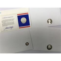 Four coin covers including 'The Bicentennial of the French Revolution 1789 1989' containing French1975 silver 50 francs, 'Queen Elizabeth the Queen Mother' containing Bailiwick of Guernsey 1995 silver one pound coin and two other coin covers 