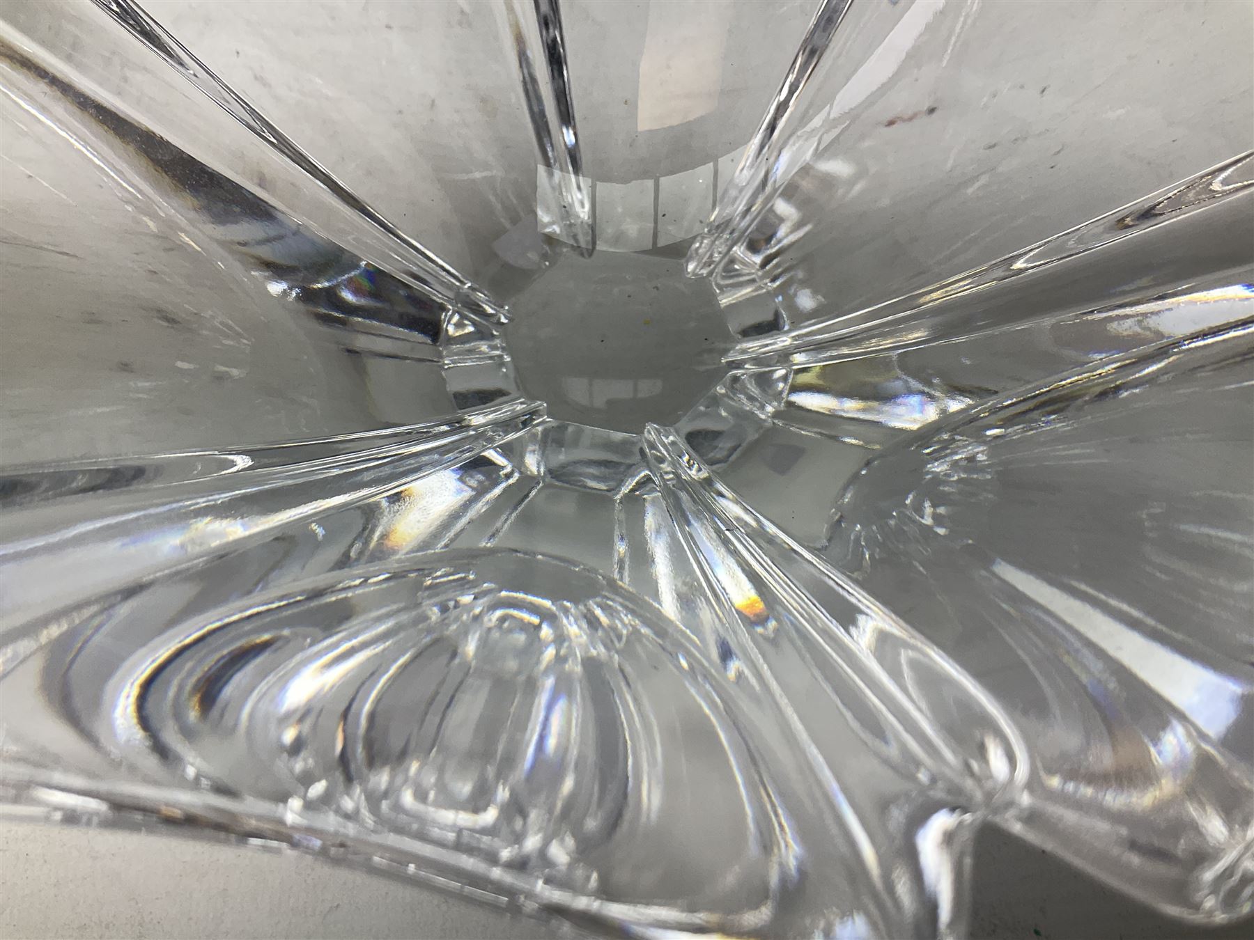 Two Orrefors Art Glass clear glass vases, the first example of compressed circular form, the second of tapering form with lobed rim, each signed beneath, tallest H14.5cm