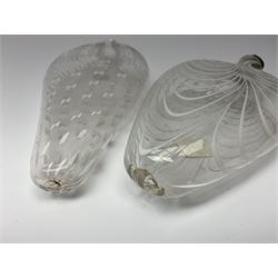 19th century Nailsea glass flask of compressed ovoid form, the clear body with opaque white combed decoration, H21cm, together with another similar example decorated with enamelled stylised bands, H23cm