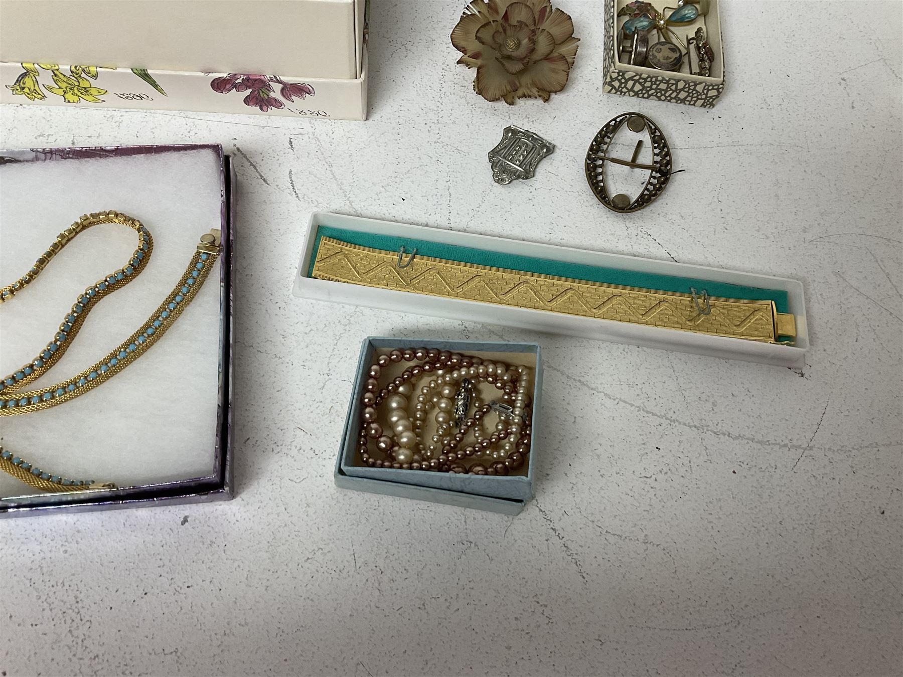 9ct gold St Christopher charm, together with a collection of costume jewellery including beaded necklaces, gold plated flat link bracelet and two wristwatches