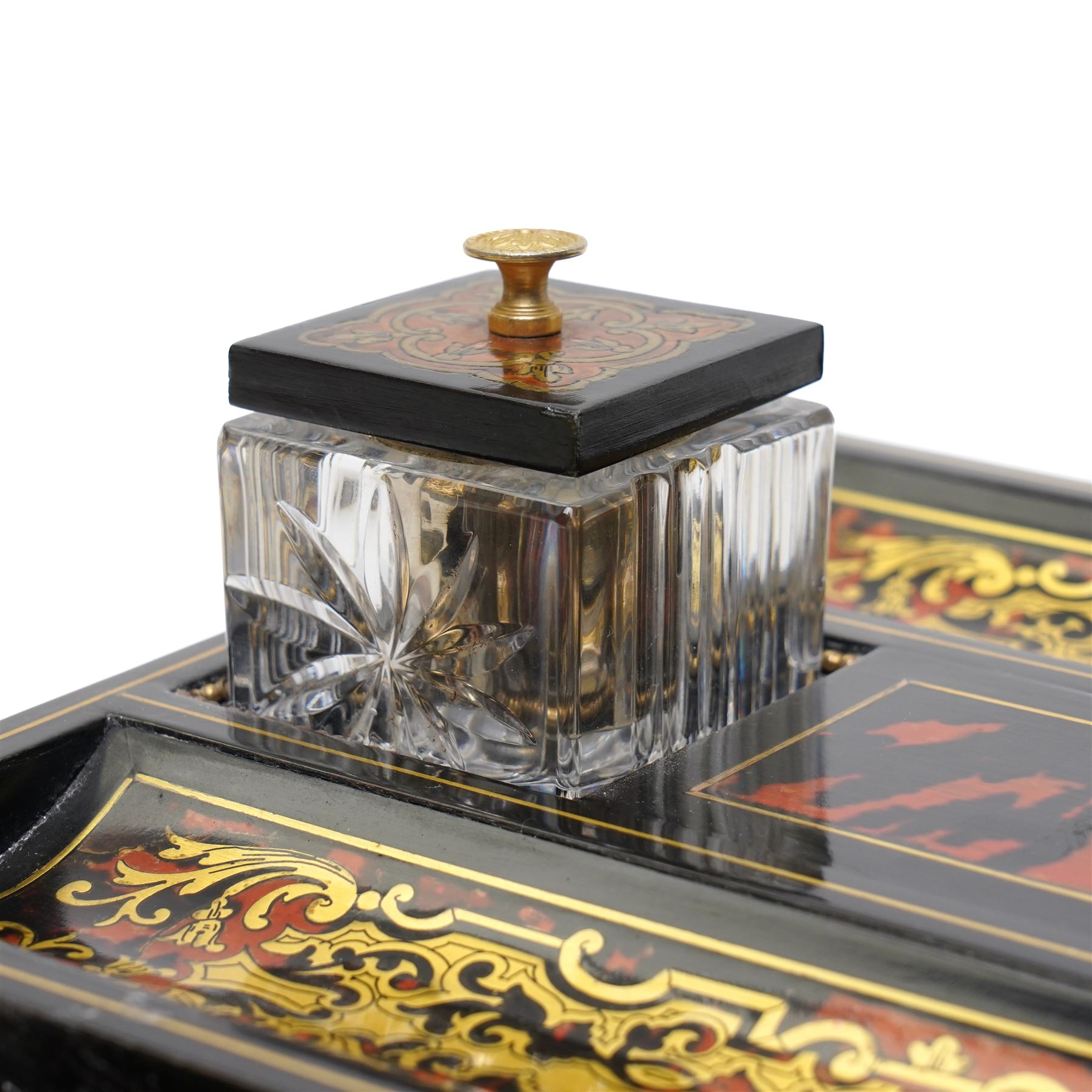 Mid 19th century Boulle inkstand in cut brass and tortoiseshell with beaded decoration with two pen trays and two inkwells on a single drawer base and compressed bun feet W32cm 