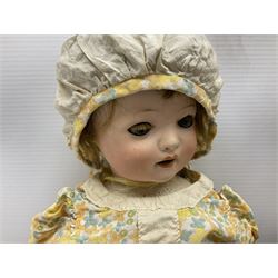 Carl Harmus Germany bisque head doll with applied hair, sleeping eyes, open mouth with teeth and composition body with jointed limbs; marked 'Harmus 313.4/0 Germany' H38cm; and Alt, Beck & Gottschalk Germany bisque head doll with applied hair, fixed eyes, open mouth with tongue and composition body with jointed limbs H44cm (2)