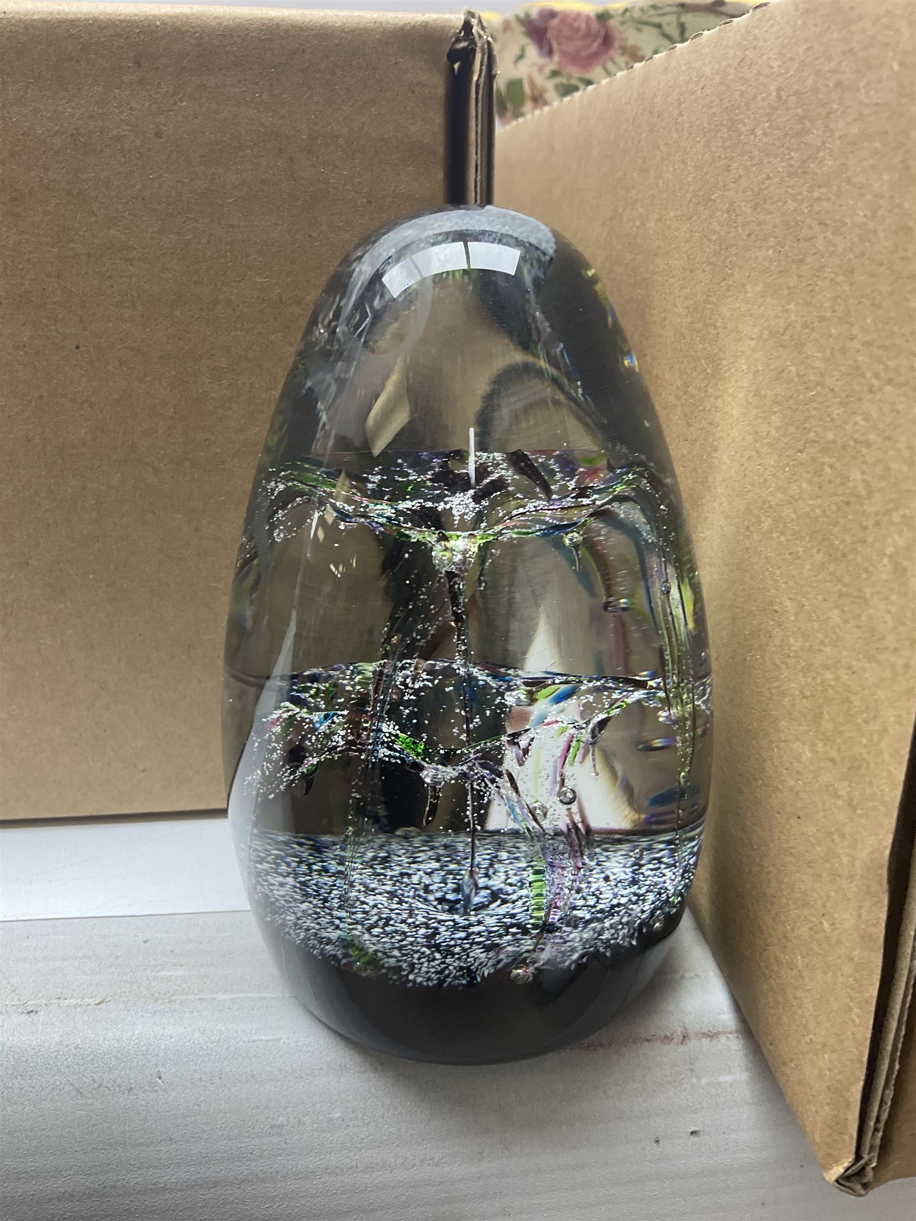 Caithness glass paperweight, together with other glassware, Zampiva figures and other collectables, in three boxes 